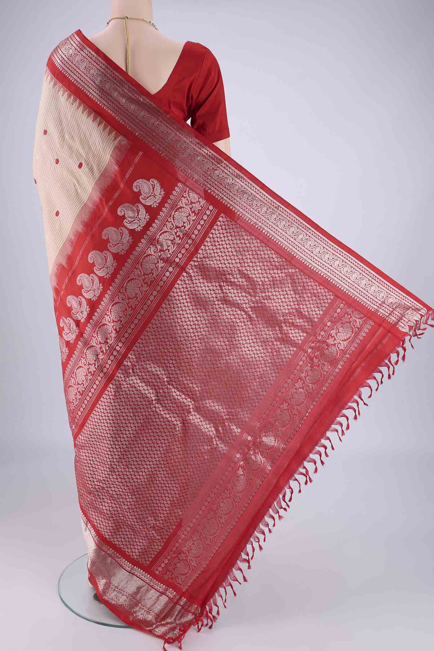 Flat view of Beige Gadwal Silk Saree with Checked design on the body and Zari Border. 