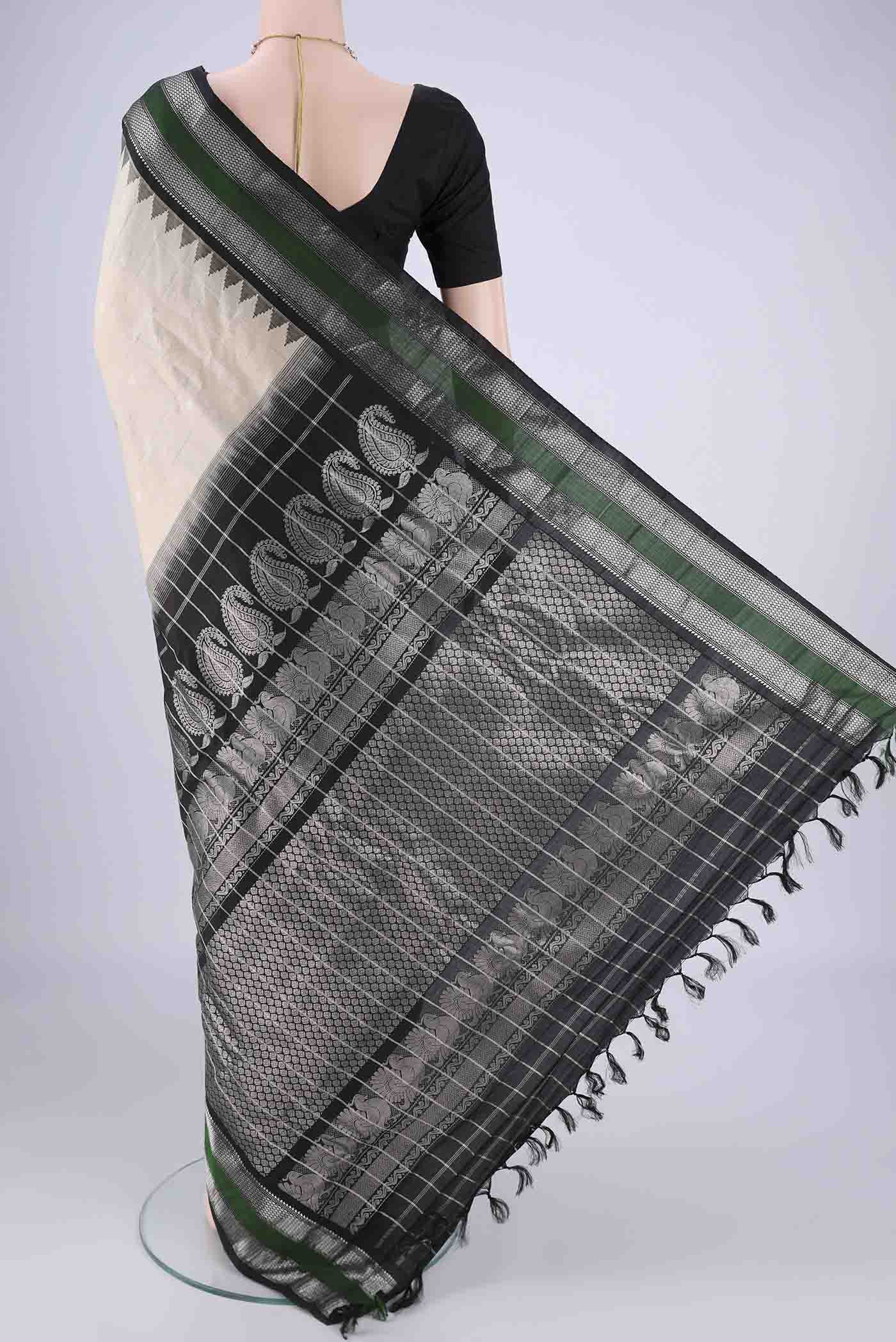 Flat view of Beige Gadwal Silk Saree with Checked design on the body and Zari Border. 