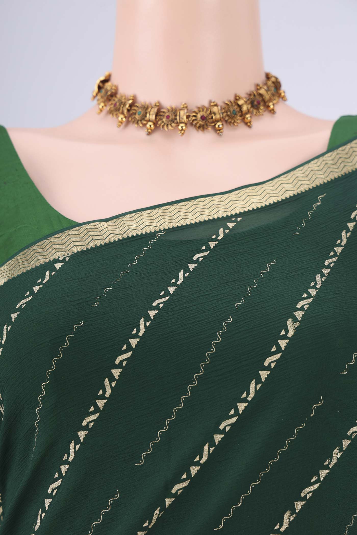 Border image of Bottle Green Mysore Chiffon Saree with Stripes on the body and Zari Border. 