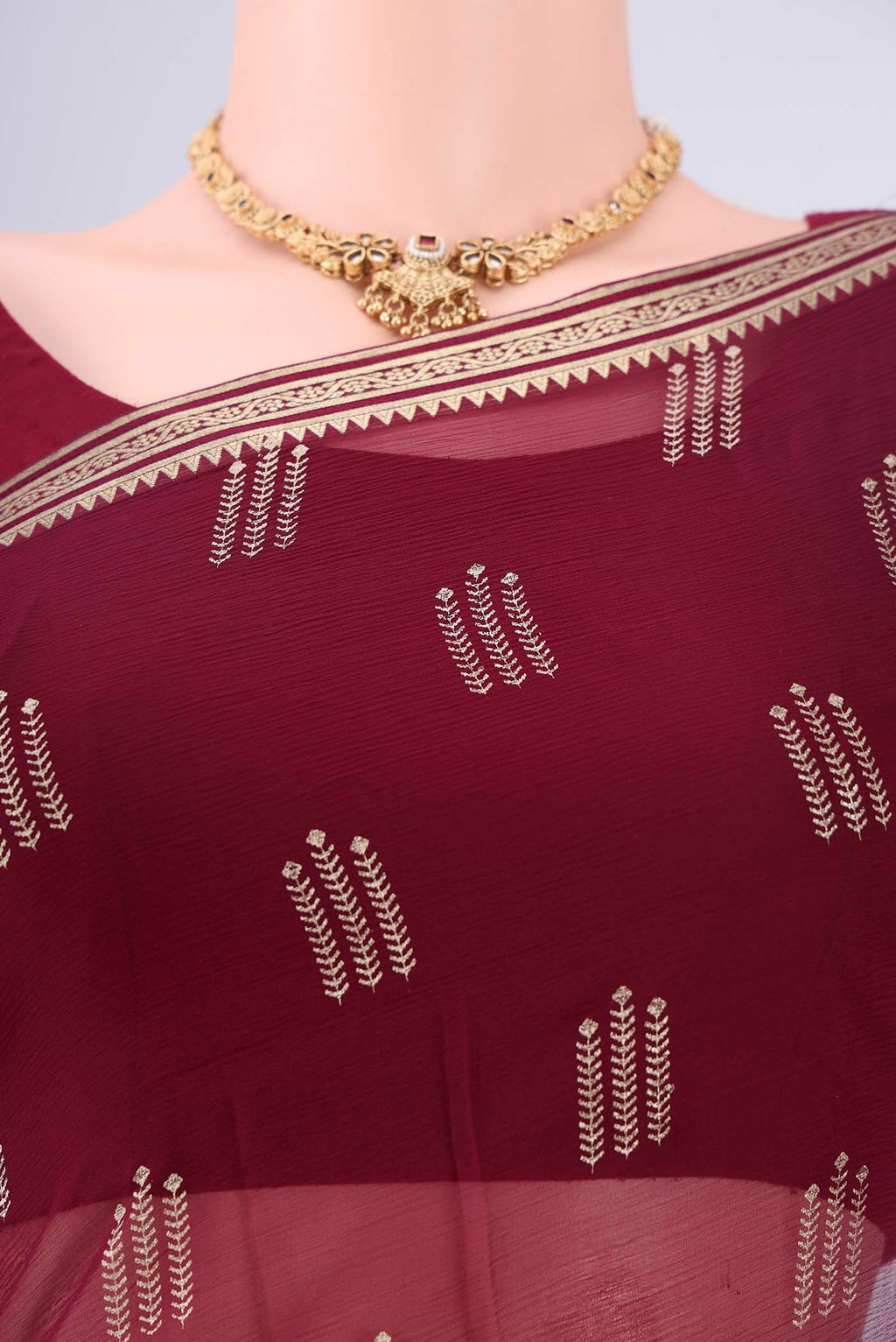 Border image of Burgundy Mysore Chiffon Saree with Zari Butta on the body and Zari Border. 