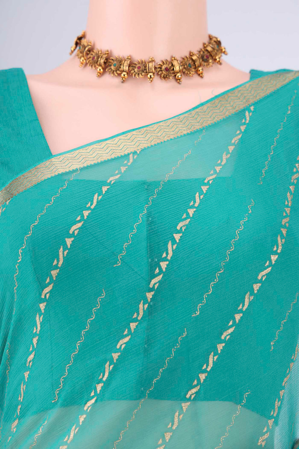 Border image of Turquoise Mysore Chiffon Saree with Stripes on the body and Zari Border. 
