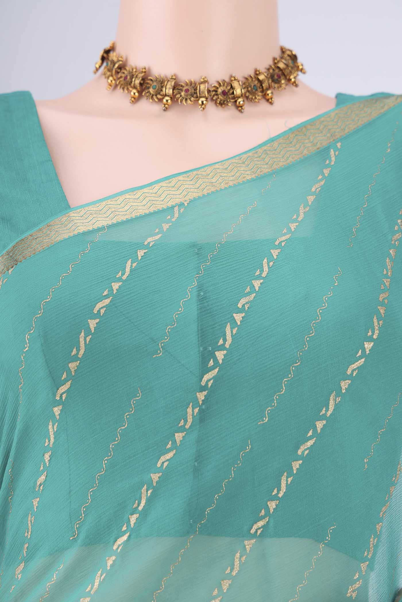 Border image of Turquoise Mysore Chiffon Saree with Stripes on the body and Zari Border. 
