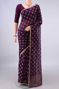 Violet Mysore Chiffon Saree with Printed design on the body and Zari Border.  displayed on a mannequin