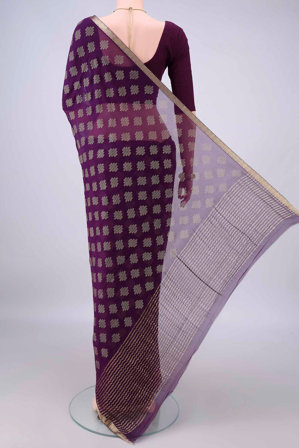 Flat view of Violet Mysore Chiffon Saree with Printed design on the body and Zari Border. 