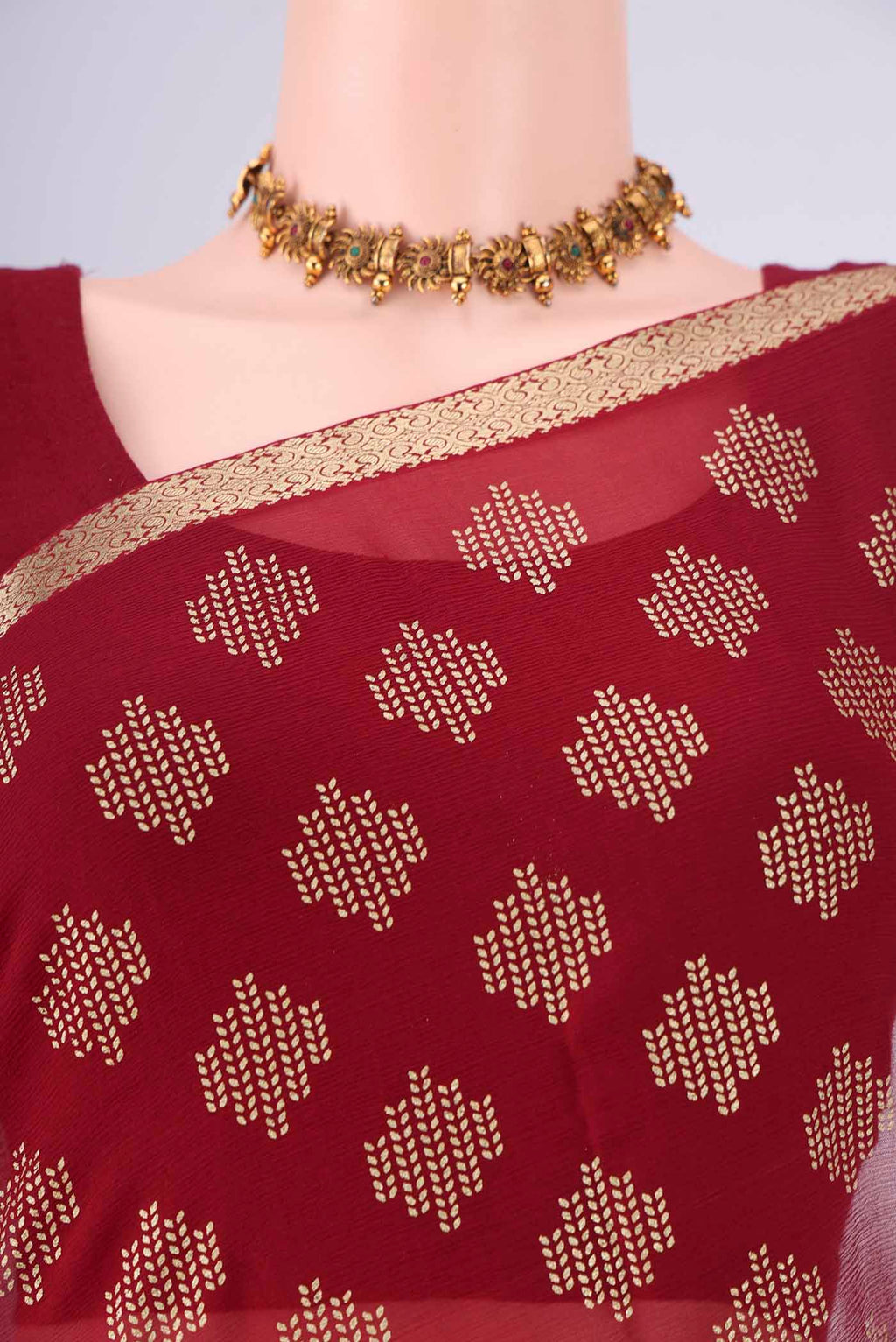 Border image of Maroon Mysore Chiffon Saree with Zari Butta on the body and Zari Border. 