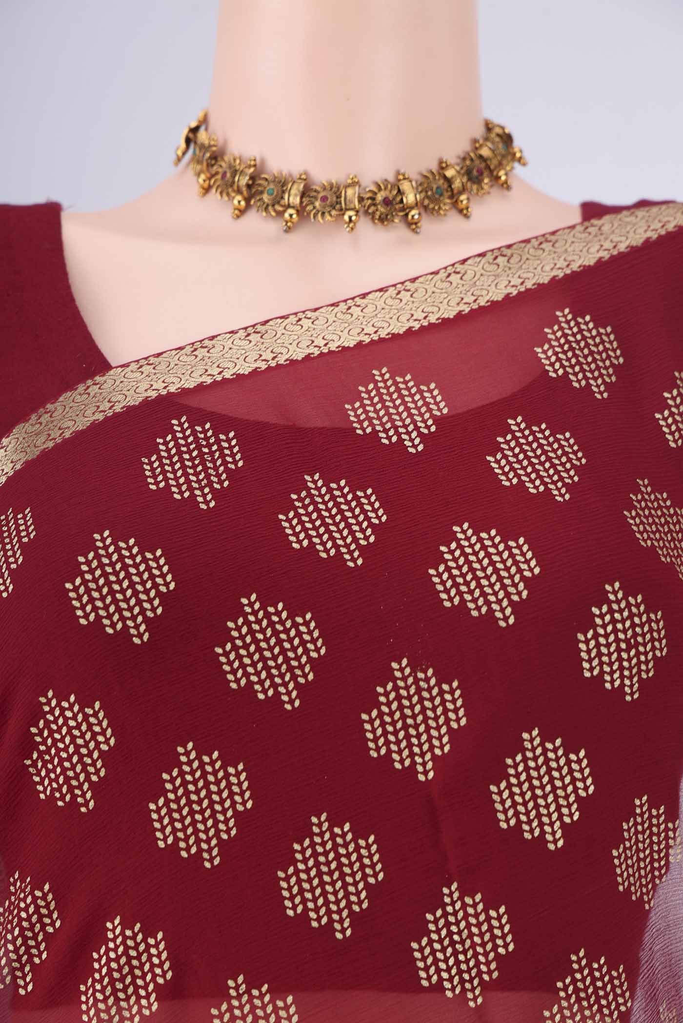 Border image of Maroon Mysore Chiffon Saree with Zari Butta on the body and Zari Border. 
