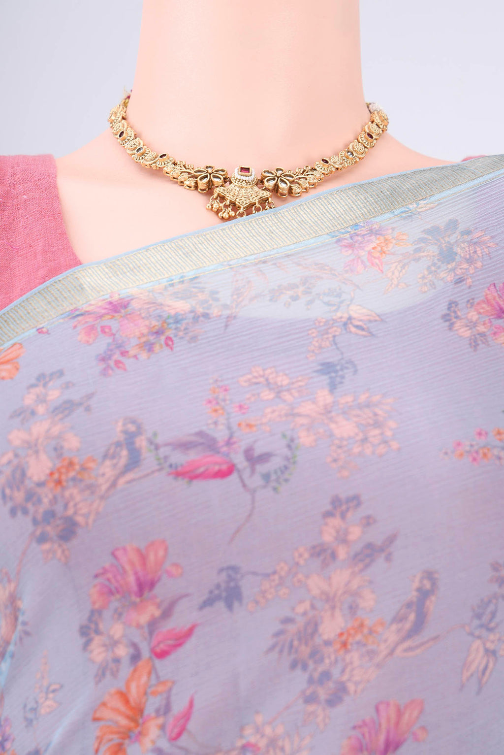 Border image of Sky Blue Mysore Crepe Saree with Printed design on the body and Zari Border. 