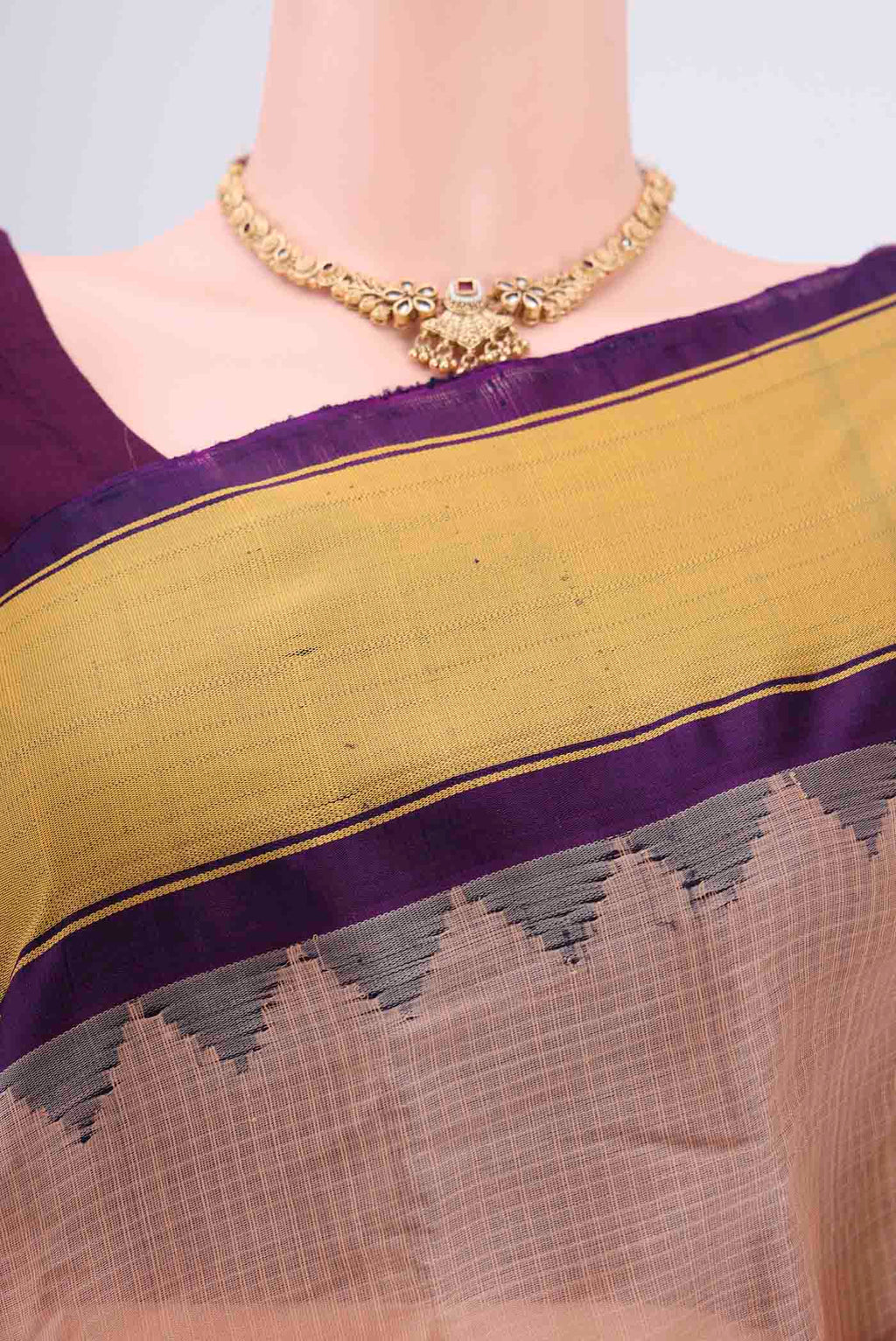 Border image of Peach Gadwal Silk Saree with Stripes on the body and Zari Border. 