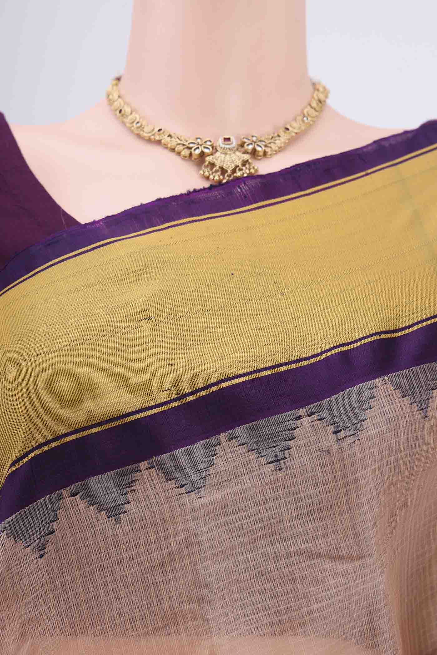 Border image of Peach Gadwal Silk Saree with Stripes on the body and Zari Border. 