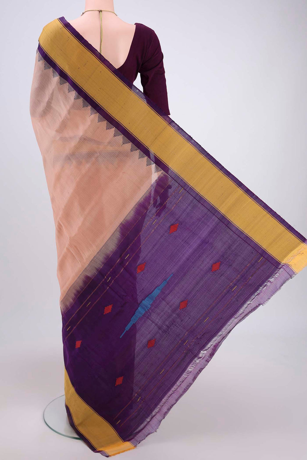Flat view of Peach Gadwal Silk Saree with Stripes on the body and Zari Border. 