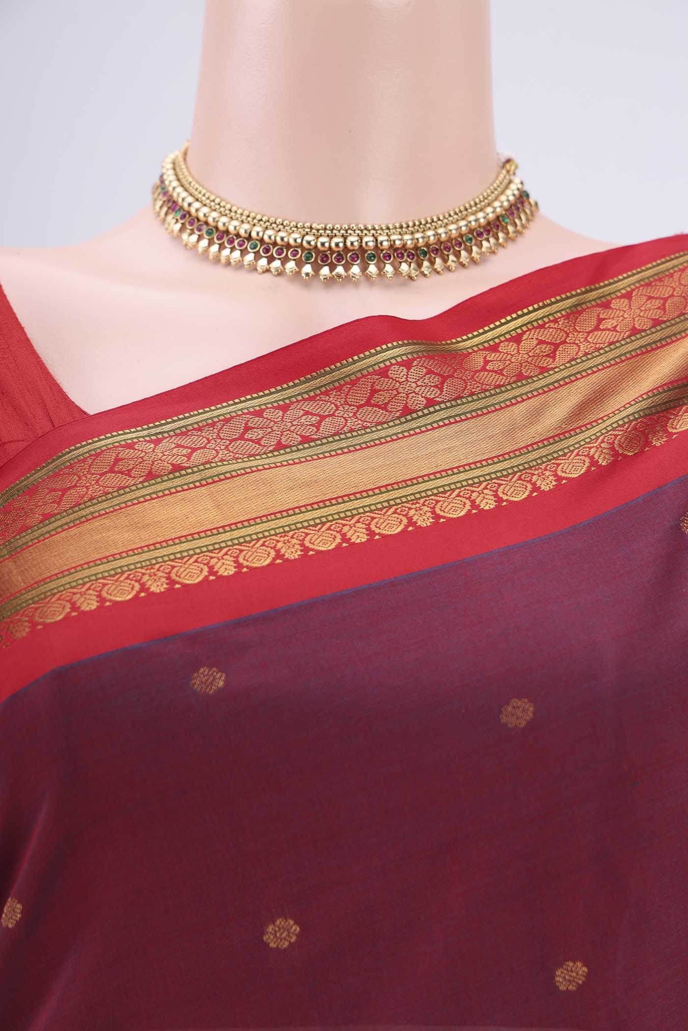 Border image of Maroon Gadwal Silk Saree with Zari Butta on the body and Zari Border. 