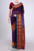 Purple Gadwal Silk Saree with Zari Butta on the body and Zari Border.  displayed on a mannequin