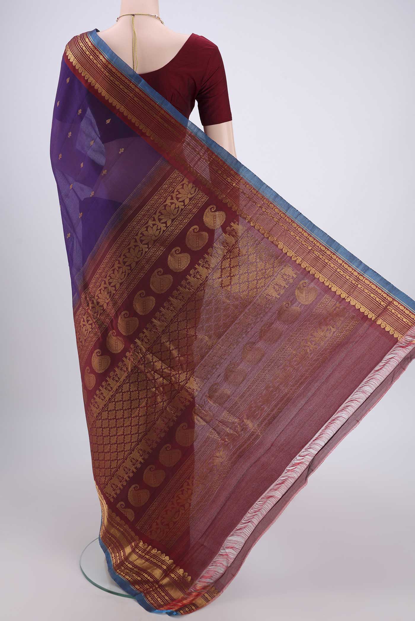 Flat view of Purple Gadwal Silk Saree with Zari Butta on the body and Zari Border. 
