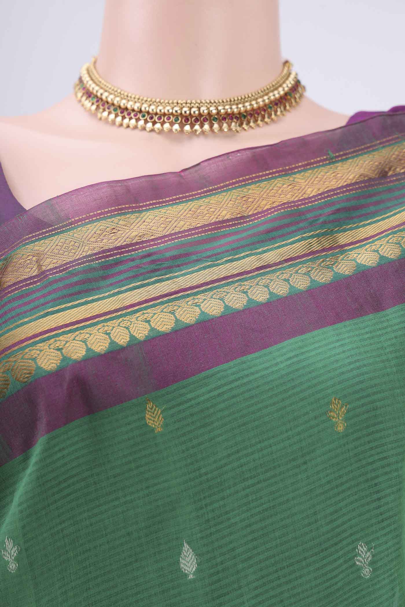 Border image of Green Gadwal Silk Saree with Stripes on the body and Zari Border. 