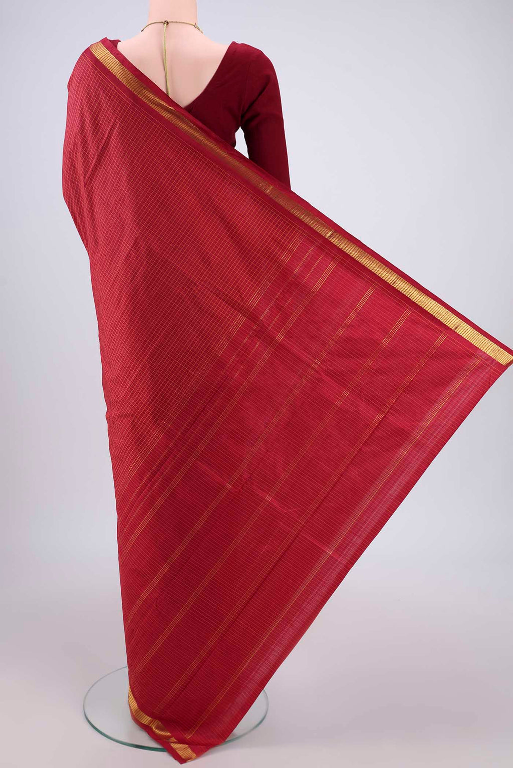 Flat view of Maroon Dual Tone Kanchipuram Silk Saree with Checked design on the body and Zari Border. 
