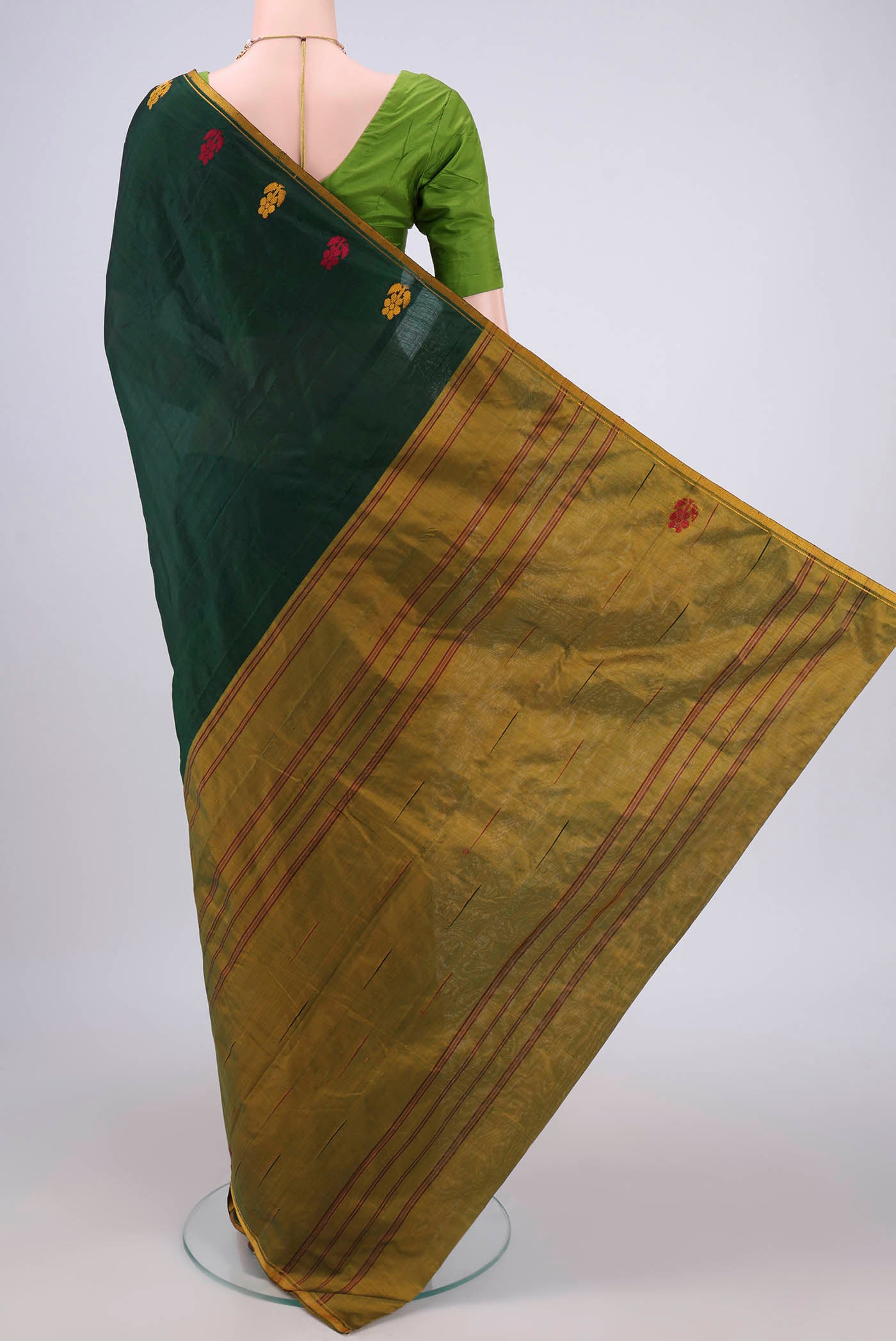 Flat view of Bottle Green Dual Tone Kanchipuram Silk Saree with Plain Body and Zari And Thread Border. 