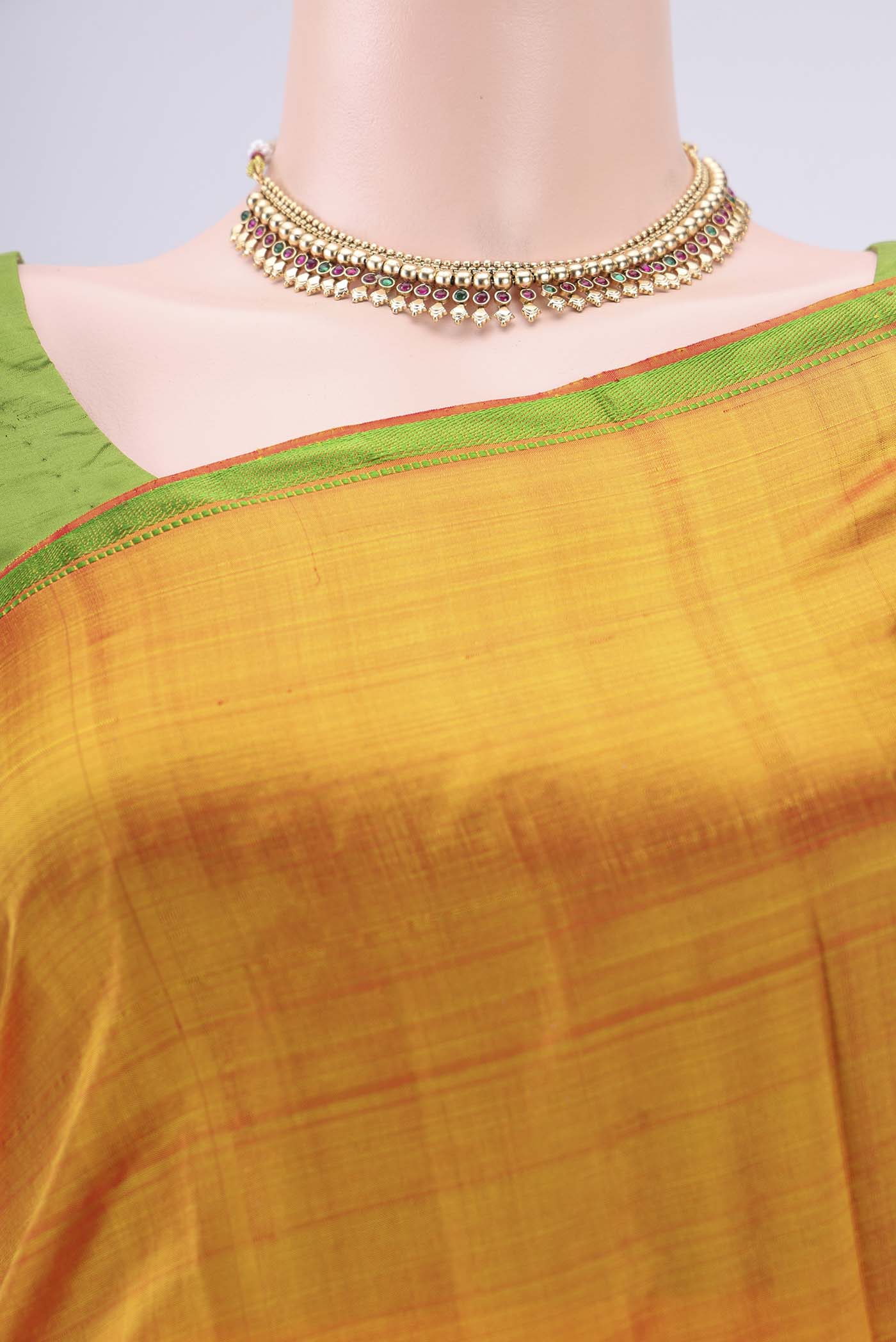 Border image of Yellow Dual Tone Kanchipuram Silk Saree with Checked design on the body and Thread Border. 