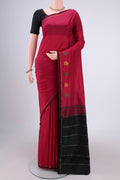 Maroon Kanchipuram Silk Saree with Plain Body and Zari And Thread Border.  displayed on a mannequin