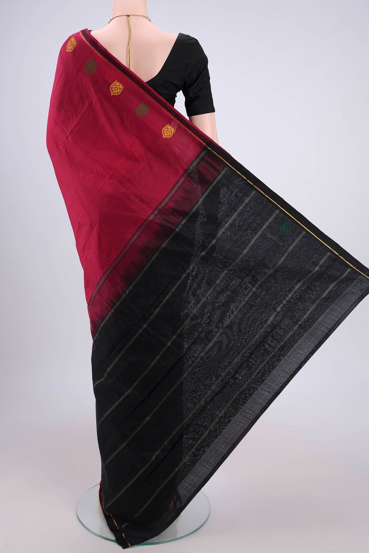 Flat view of Maroon Kanchipuram Silk Saree with Plain Body and Zari And Thread Border. 