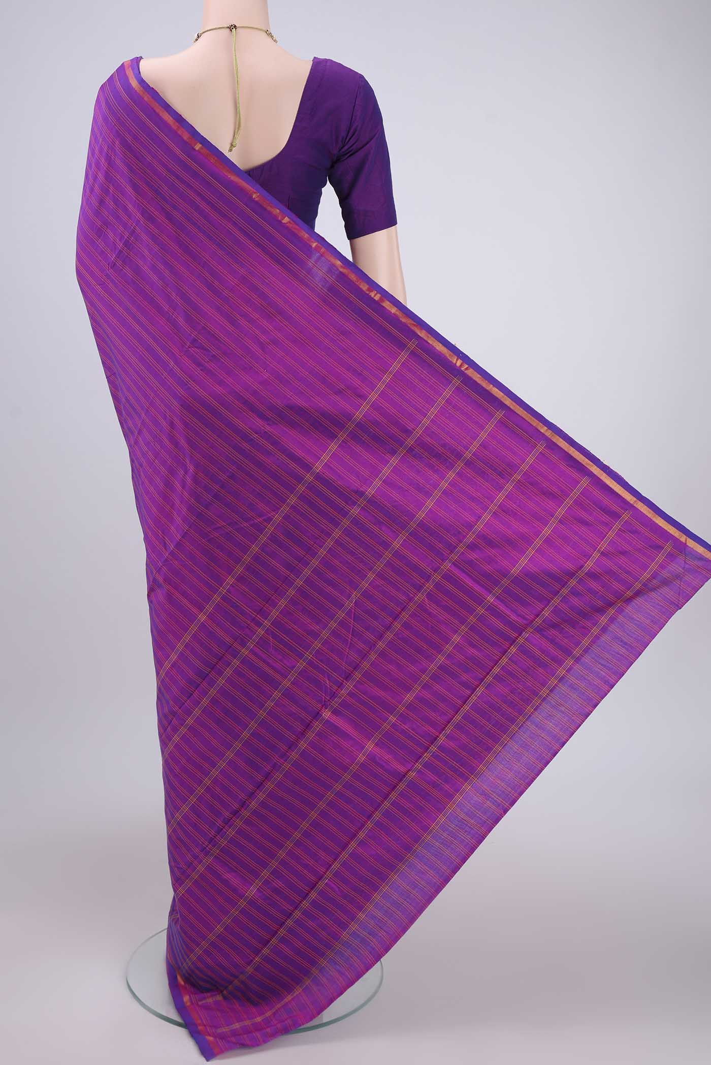 Flat view of Magenta Kanchipuram Silk Saree with Stripes on the body and Zari Border. 