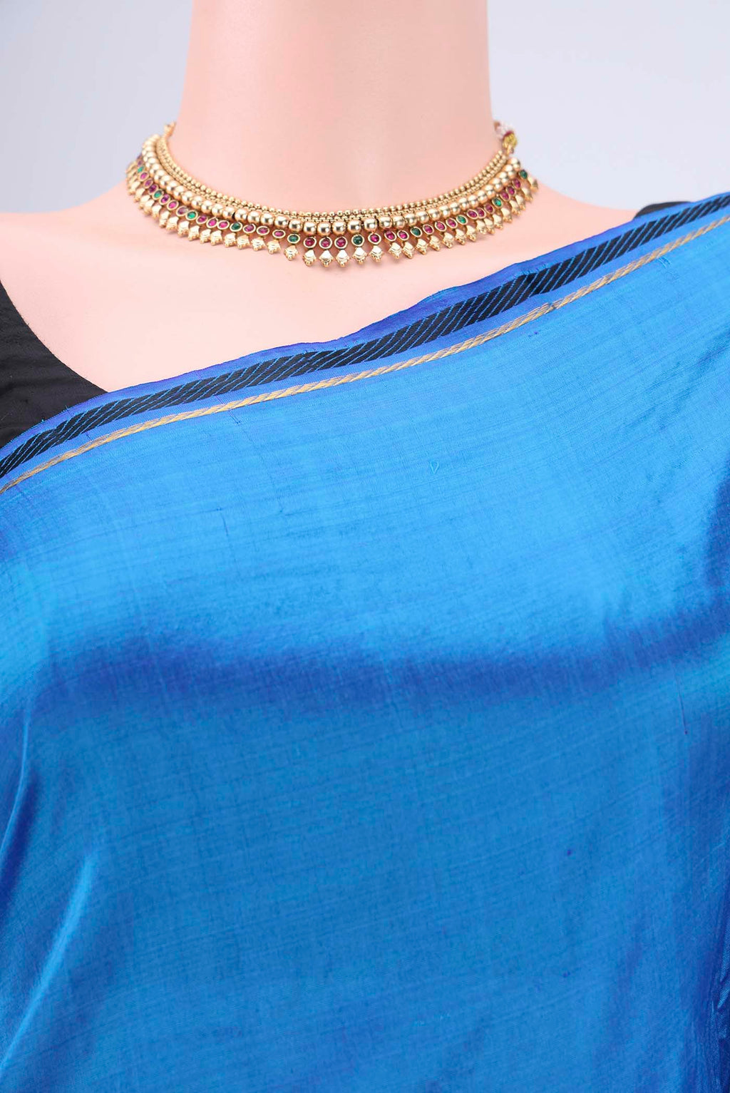 Border image of Blue Kanchipuram Silk Saree with Plain Body and Zari Border. 