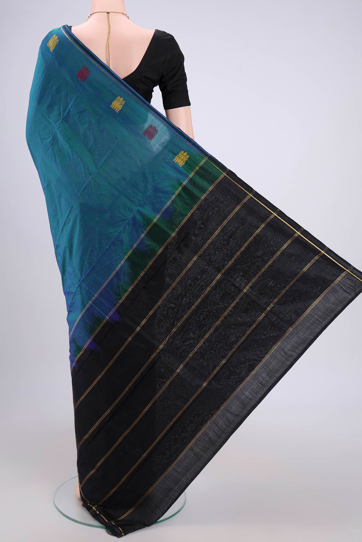Flat view of Peacock Blue Kanchipuram Silk Saree with Plain Body and Zari And Thread Border. 