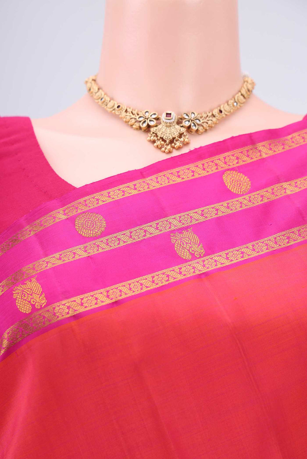 Border image of Orange Dual Tone Kanchipuram Silk Saree with Plain Body and Attached Border. 
