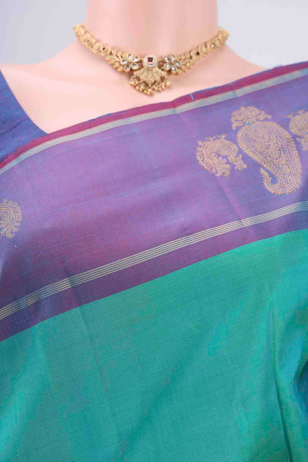 Border image of Turquoise Dual Tone Kanchipuram Silk Saree with Plain Body and Attached Border. 