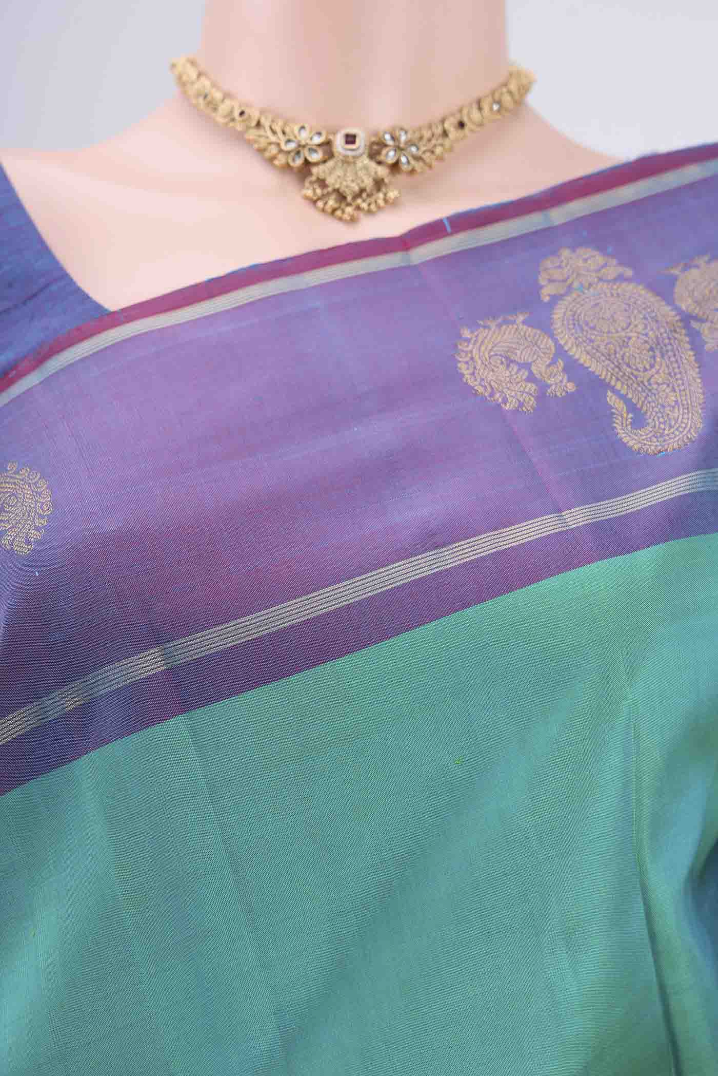Border image of Turquoise Dual Tone Kanchipuram Silk Saree with Plain Body and Attached Border. 