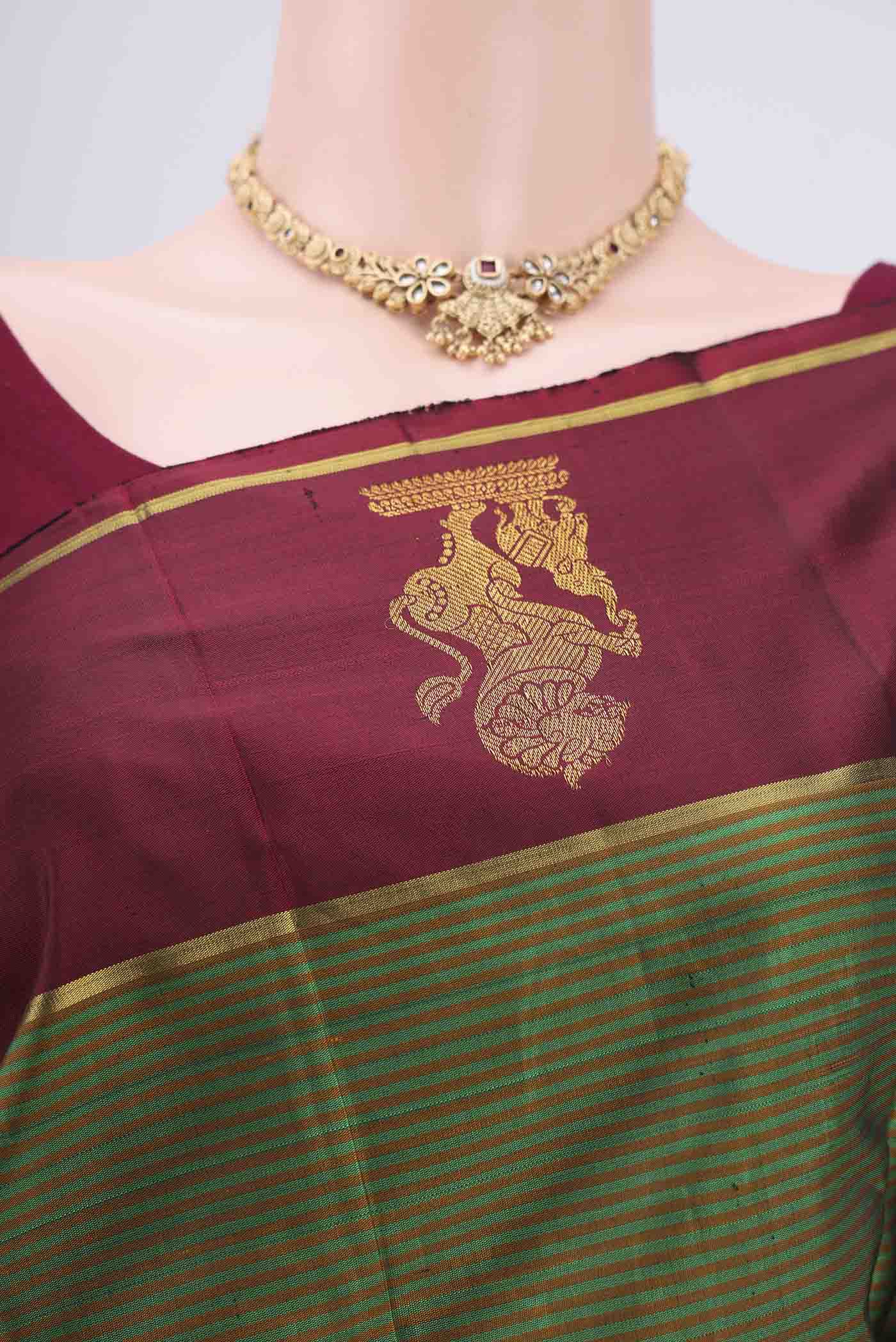 Border image of Green Kanchipuram Silk Saree with Stripes on the body and Attached Border. 