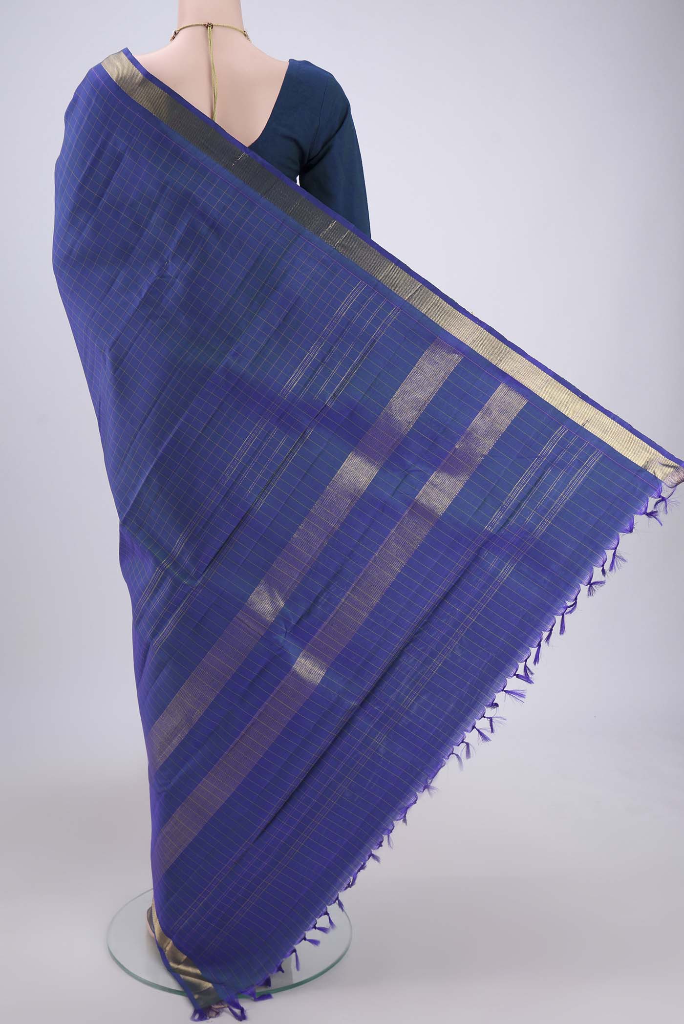 Flat view of Blue Dual Tone Kanjivaram Silk Saree with Checked design on the body and Zari Border. 