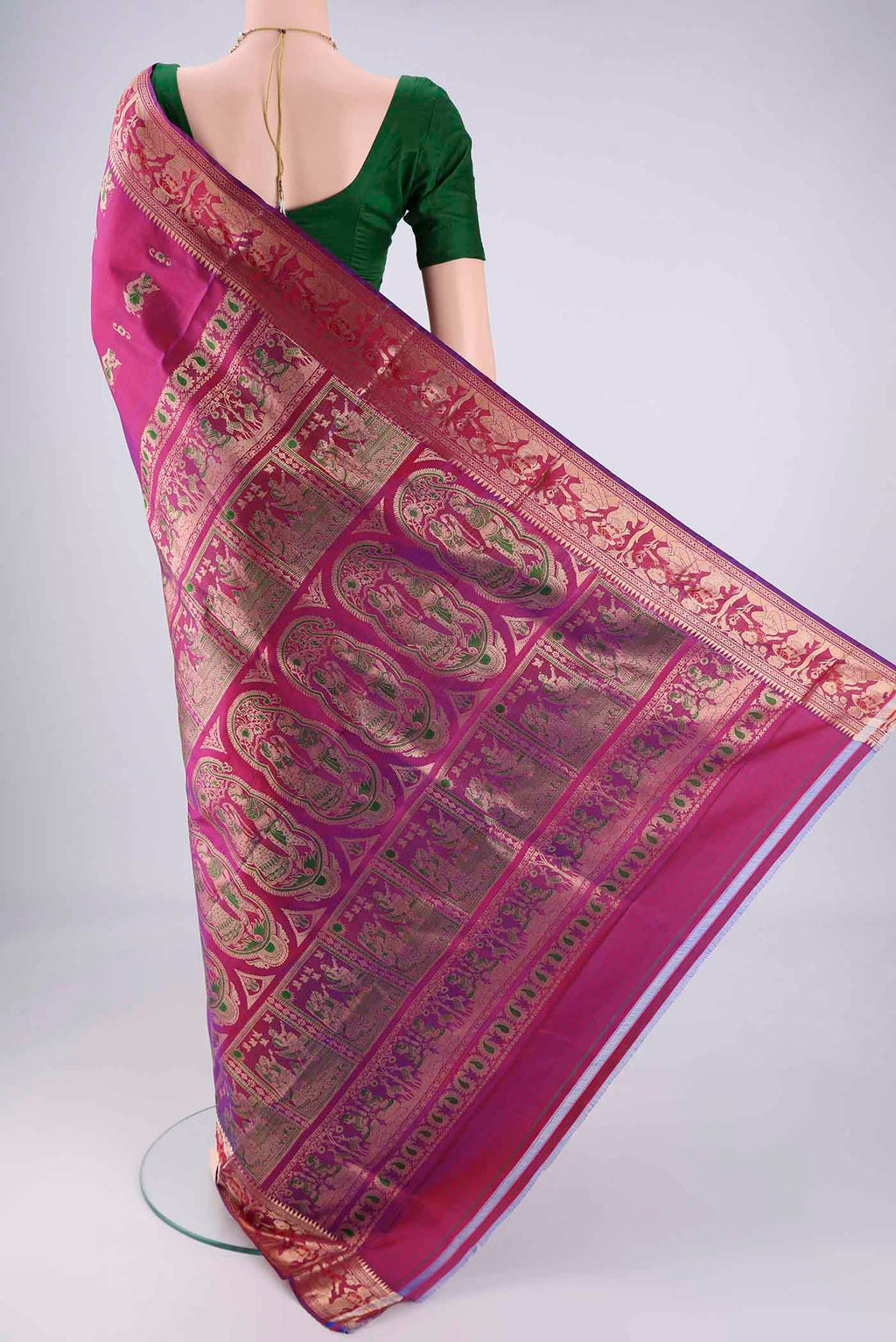 Flat view of Magenta Baluchari Silk Saree with Zari And Thread Butta on the body and Zari And Thread Border. 