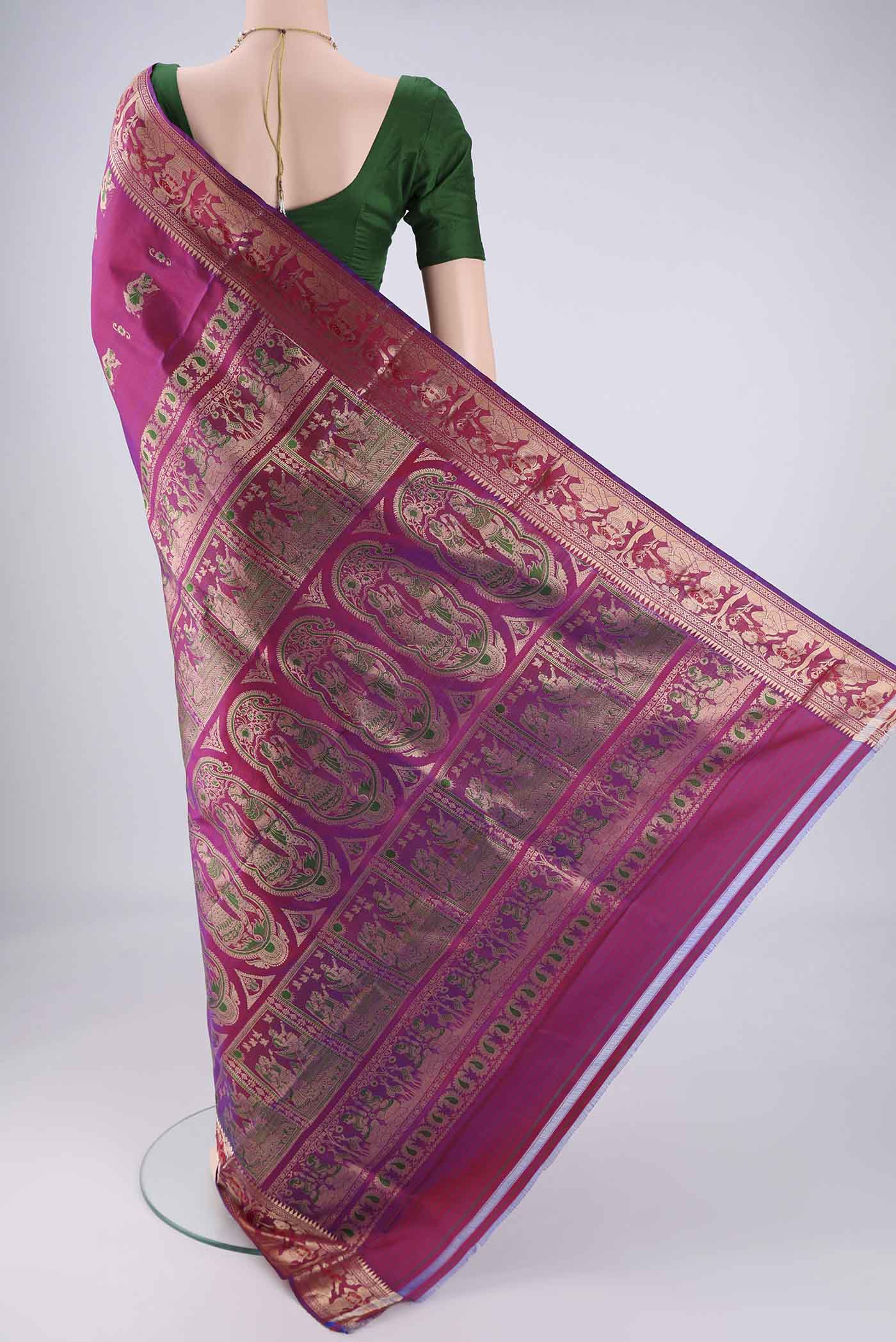 Flat view of Magenta Baluchari Silk Saree with Zari And Thread Butta on the body and Zari And Thread Border. 