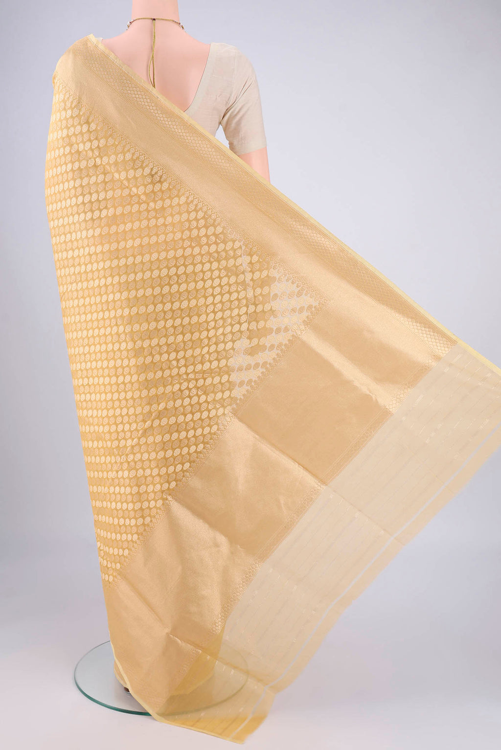 Flat view of Sandal Banarasi Silk Saree with Jacquard With Zari Butta on the body and Zari Border. 