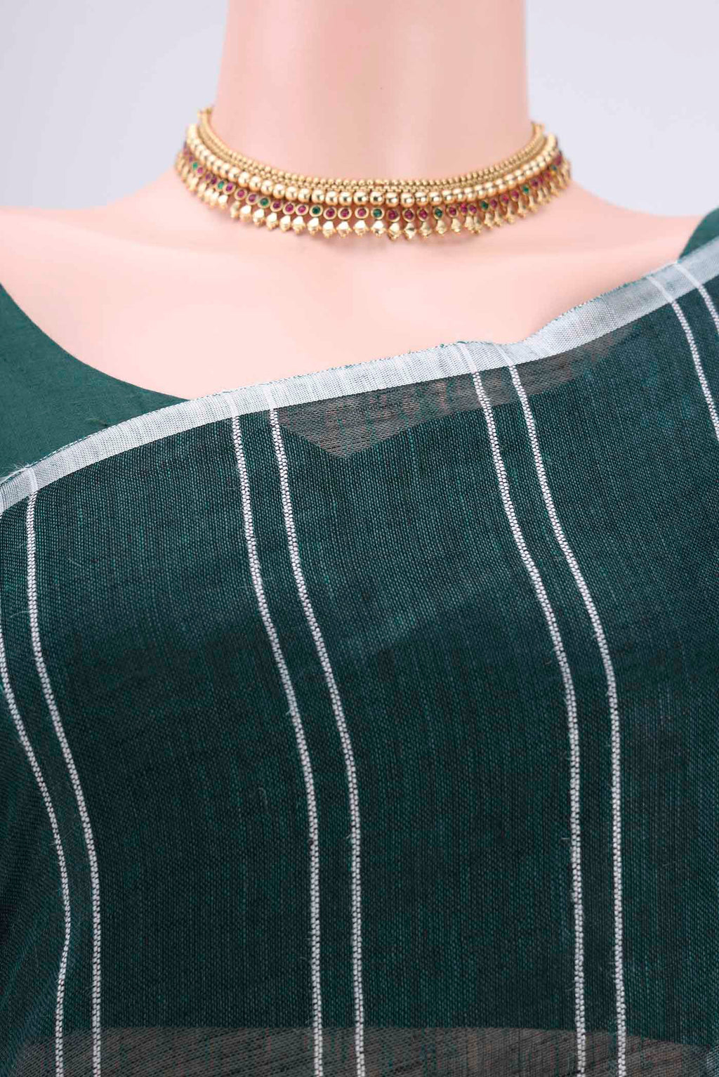 Border image of Bottle Green Blended Linen Saree with Stripes on the body and Zari Border. 