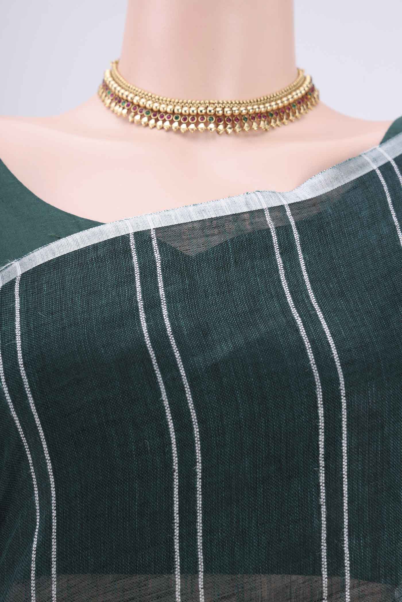 Border image of Bottle Green Blended Linen Saree with Stripes on the body and Zari Border. 