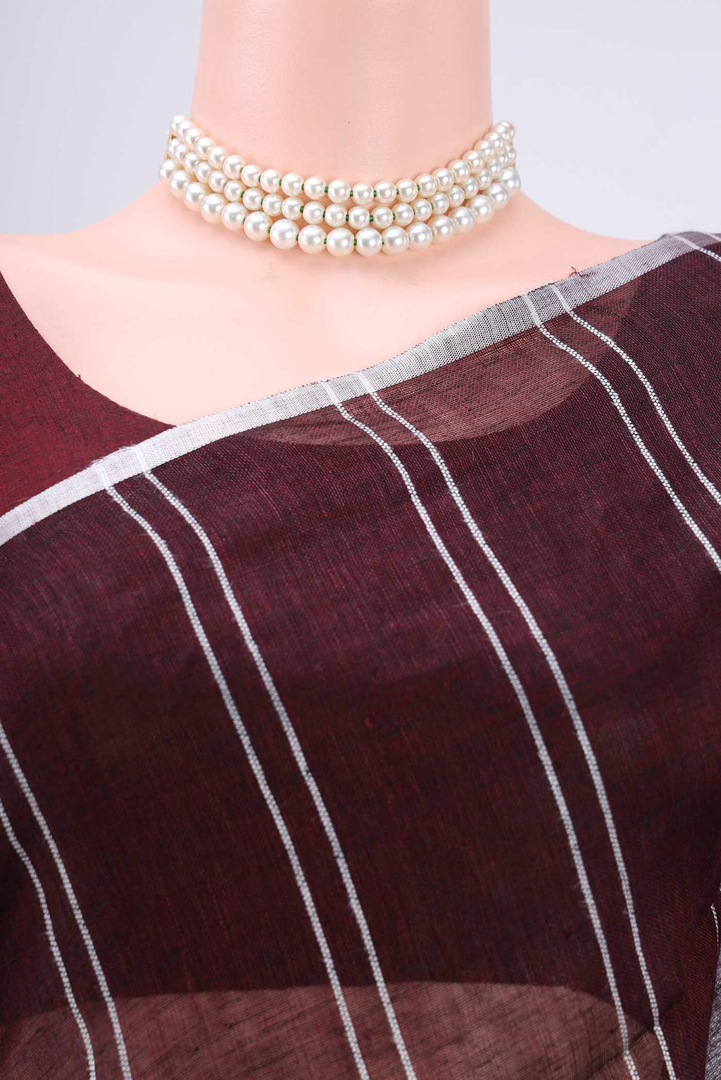 Border image of Brown Blended Linen Saree with Stripes on the body and Zari Border. 