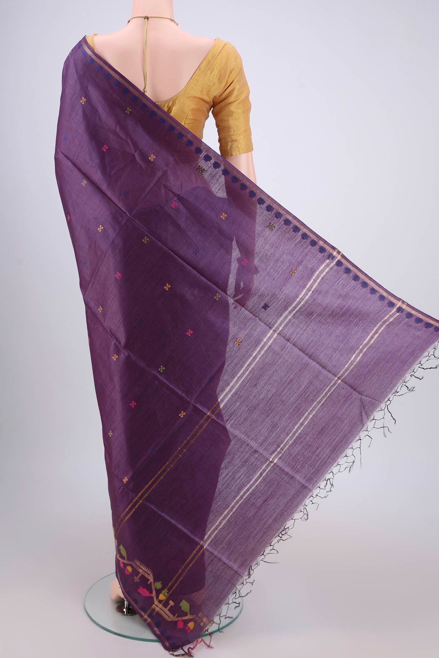 Flat view of Purple Tussar Silk Saree with Jamdani on the body and Zari Border. 