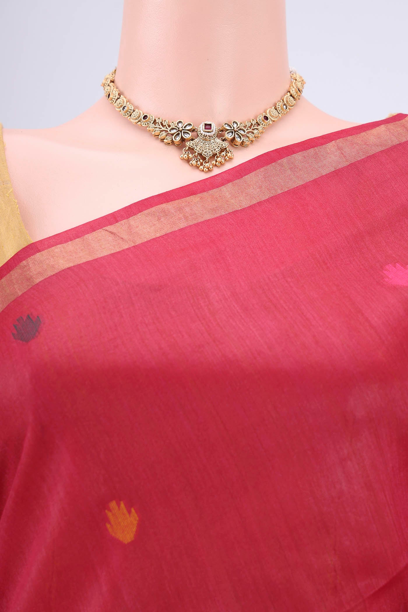 Border image of Red Tussar Silk Saree with Jamdani on the body and Zari Border. 