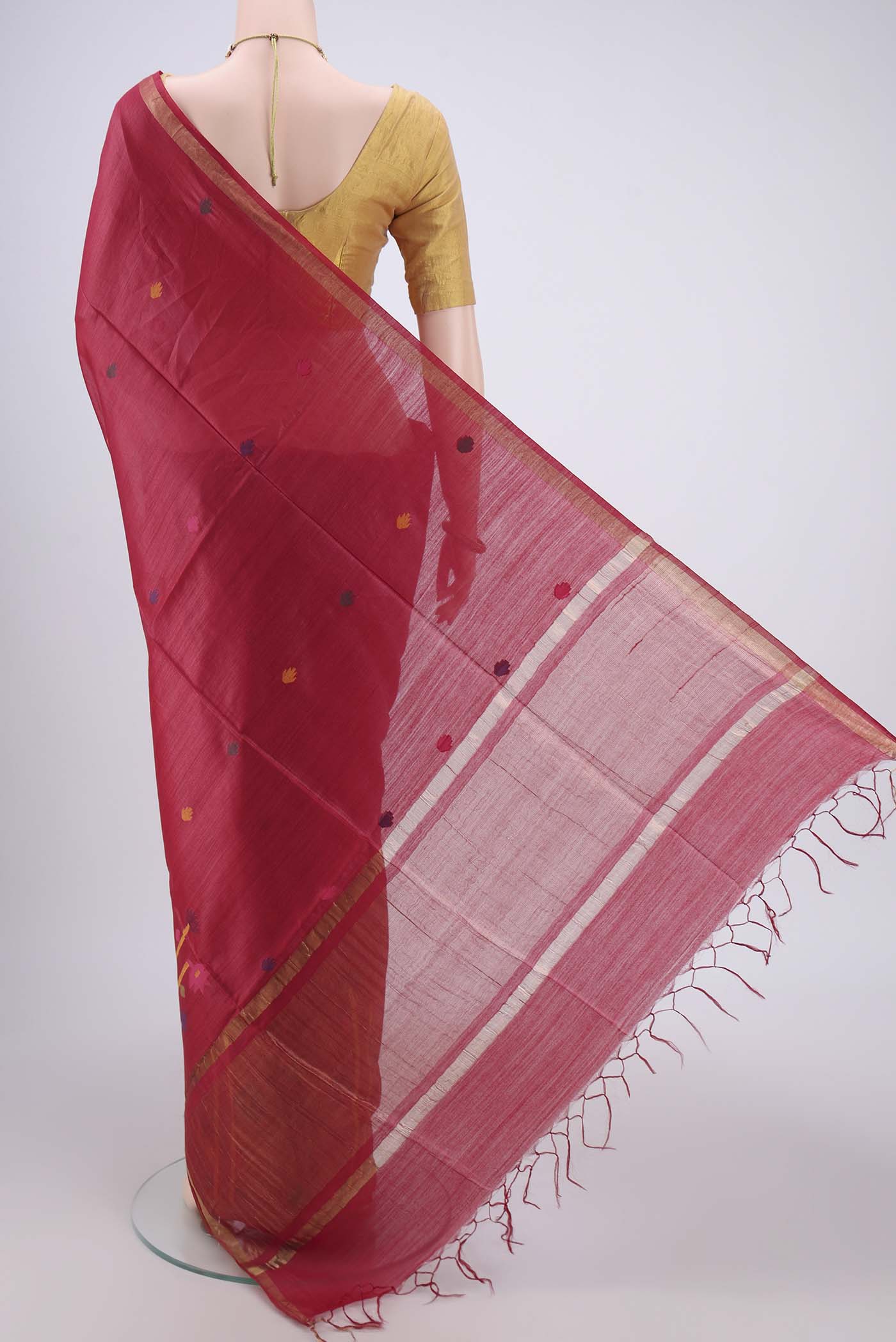 Flat view of Red Tussar Silk Saree with Jamdani on the body and Zari Border. 