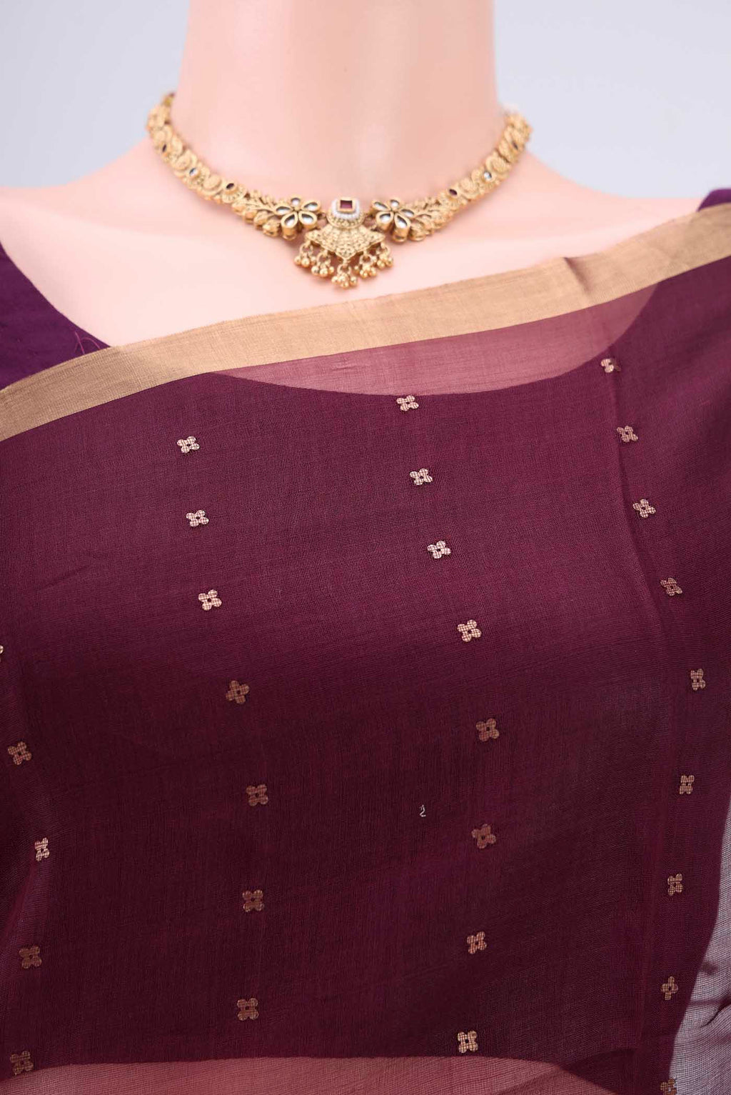 Border image of Maroon Kora Silk Saree with Fancy on the body and Zari Border. 