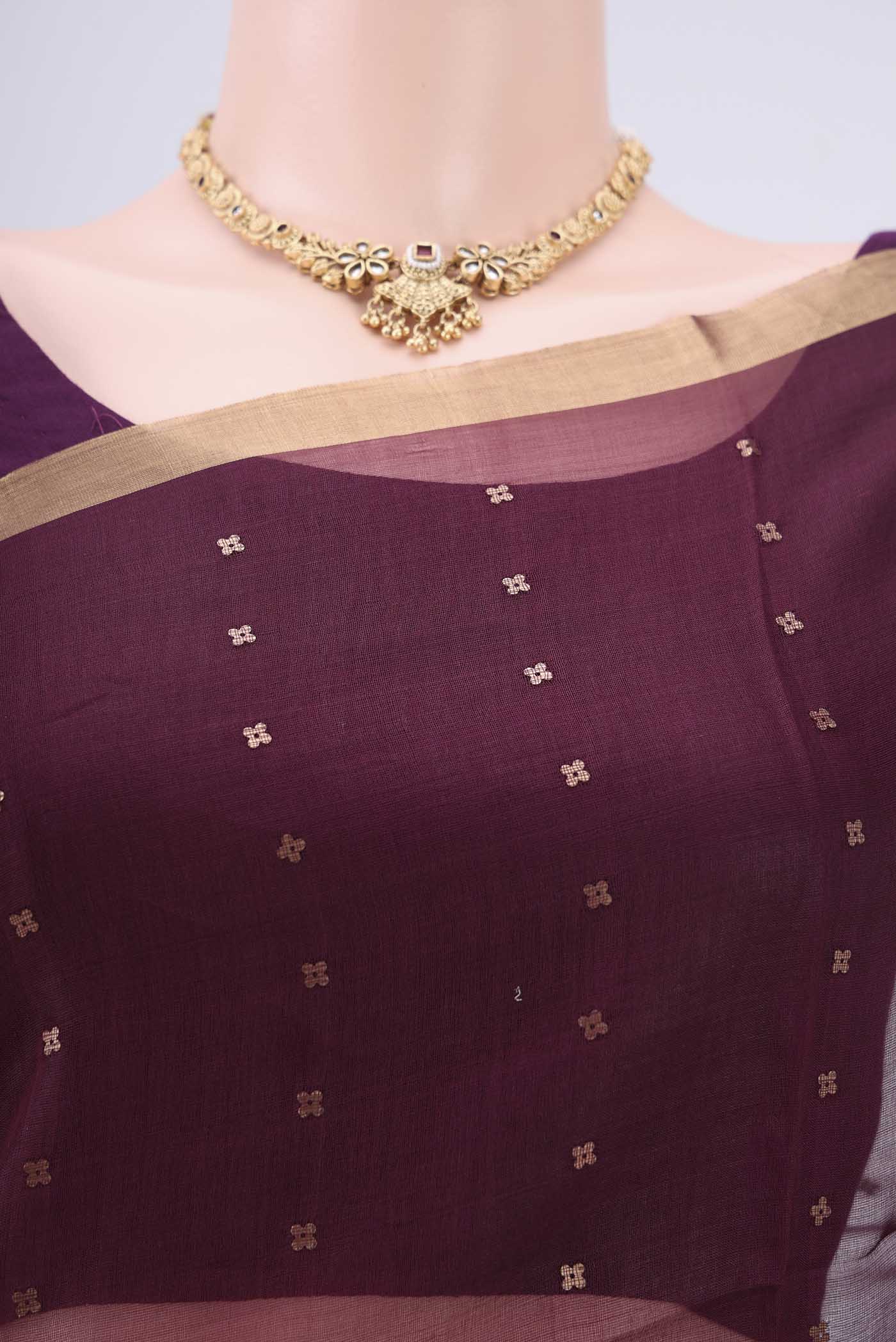 Border image of Maroon Kora Silk Saree with Fancy on the body and Zari Border. 