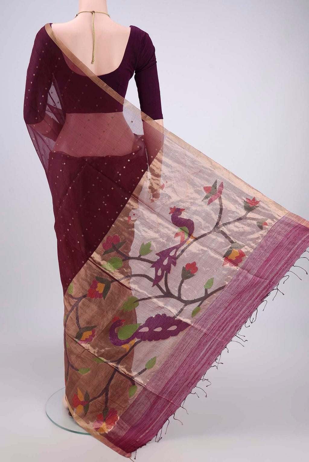 Flat view of Maroon Kora Silk Saree with Fancy on the body and Zari Border. 