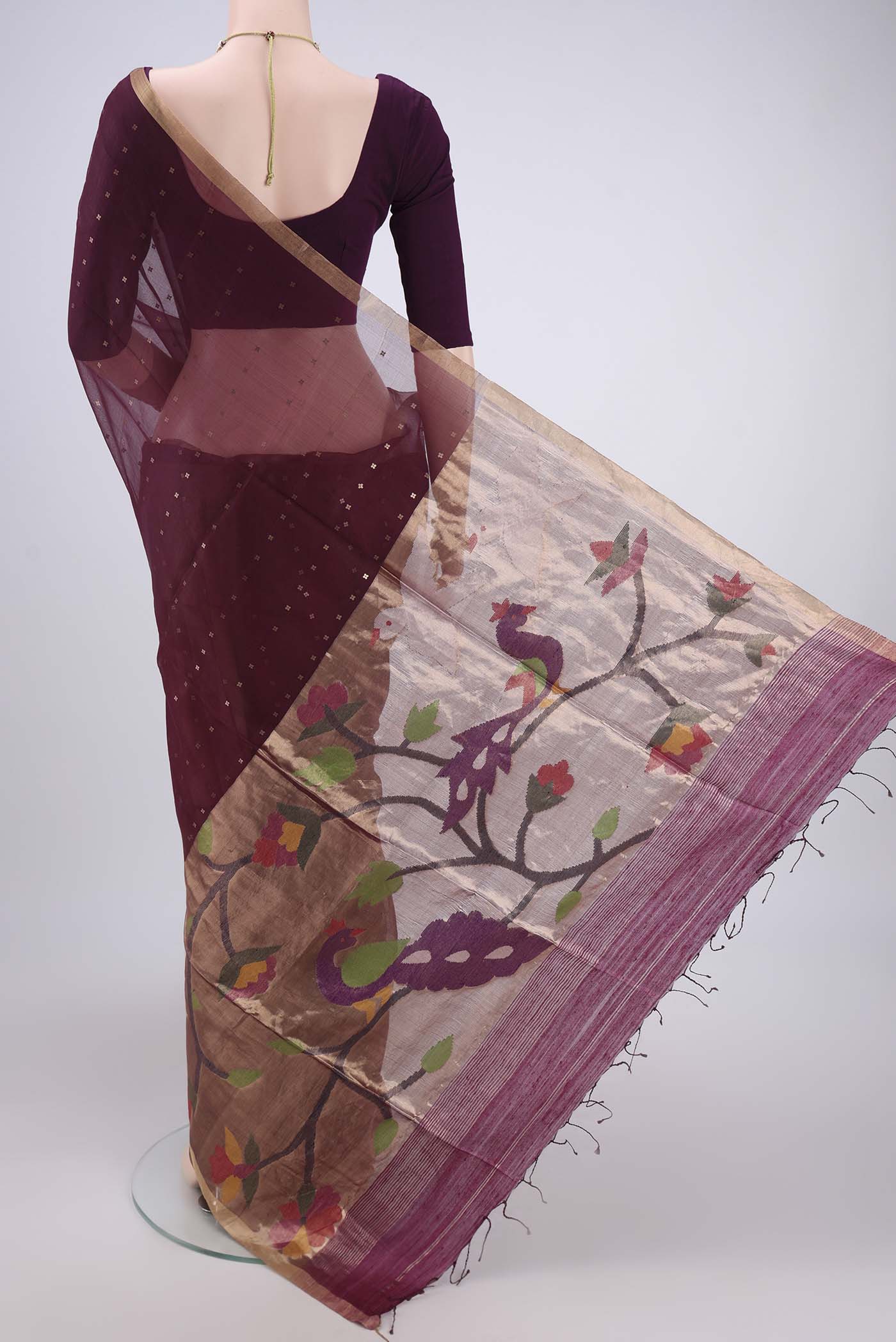 Flat view of Maroon Kora Silk Saree with Fancy on the body and Zari Border. 