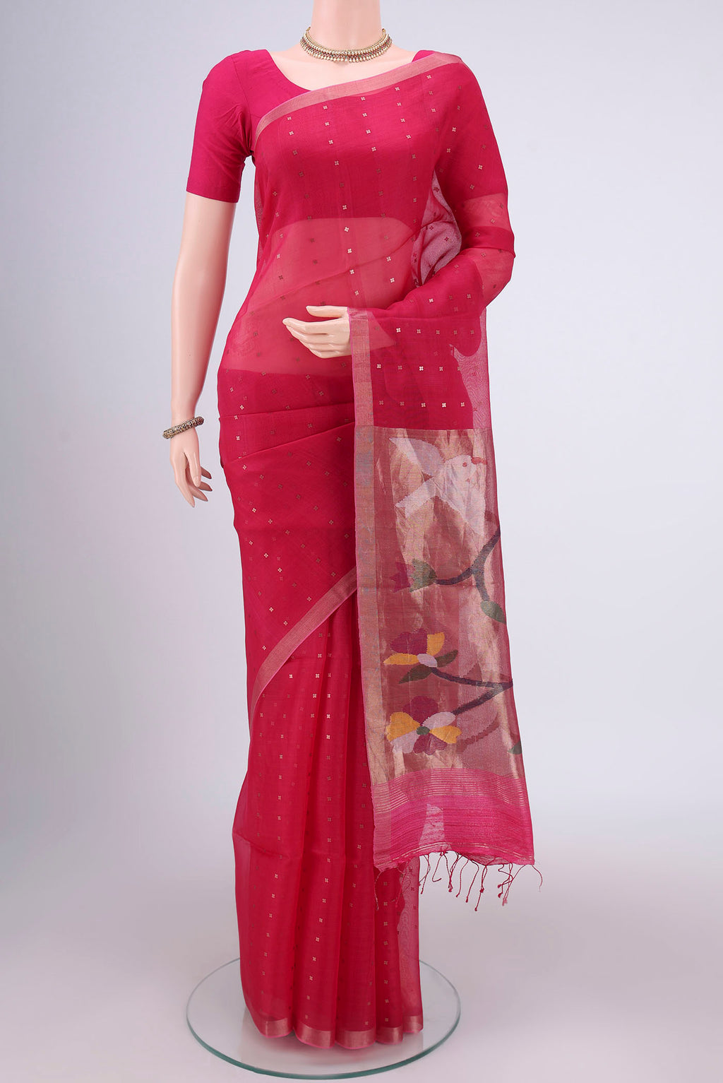 Dark Pink Kora Silk Saree with Fancy on the body and Zari Border.  displayed on a mannequin
