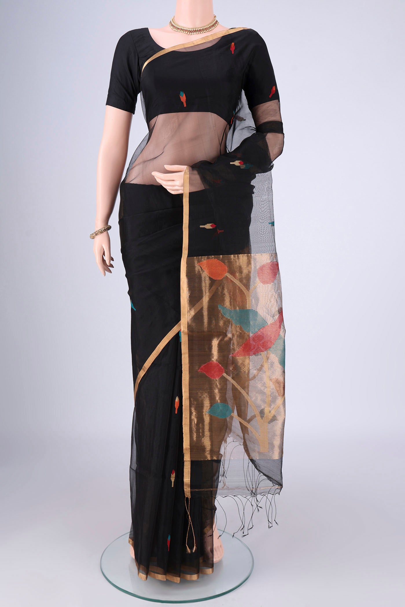 Black Muslin Silk Saree with Jamdani on the body and Zari Border.  displayed on a mannequin