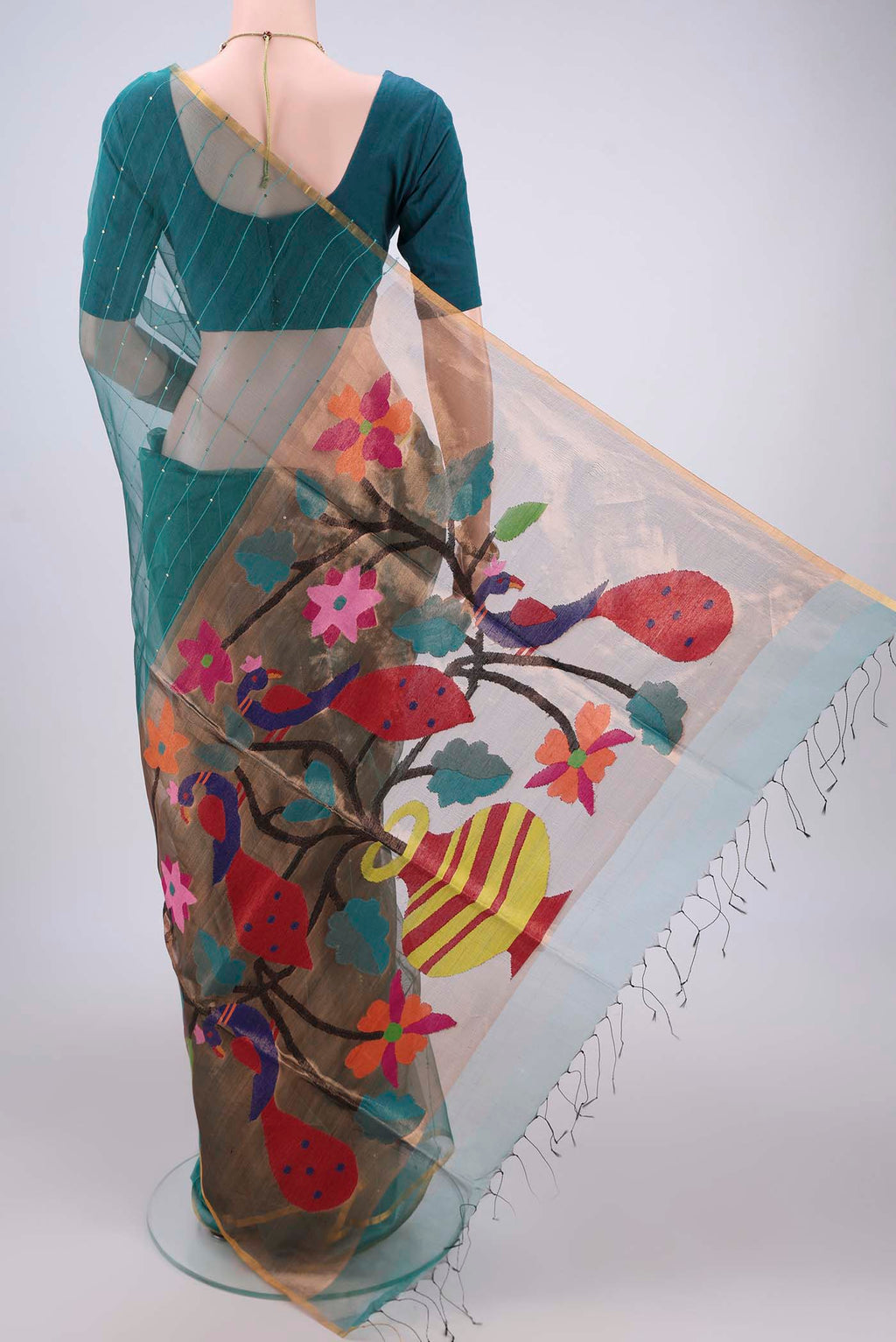 Flat view of Sea Green Kora Silk Saree with Fancy on the body and Zari Border. 