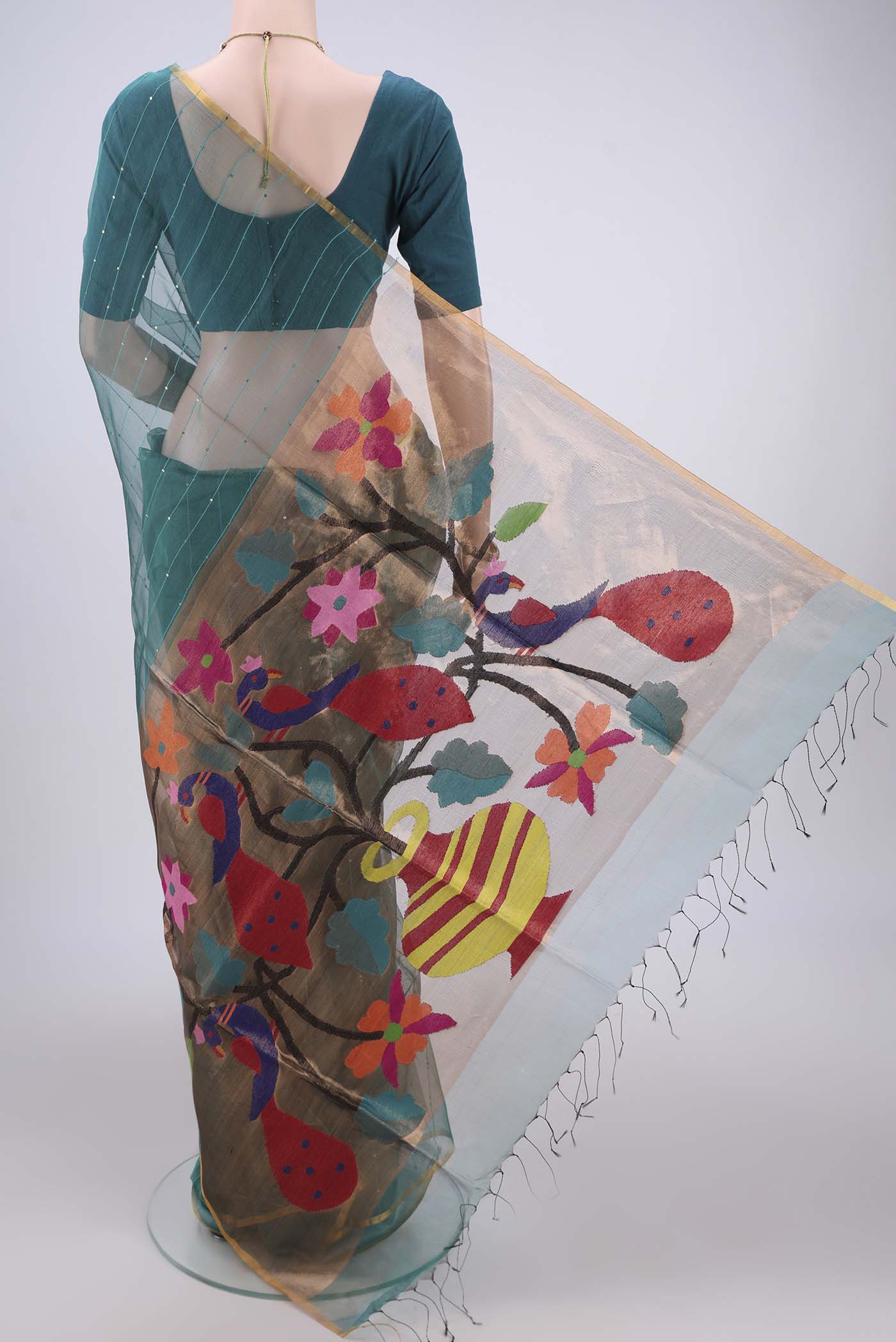 Flat view of Sea Green Kora Silk Saree with Fancy on the body and Zari Border. 