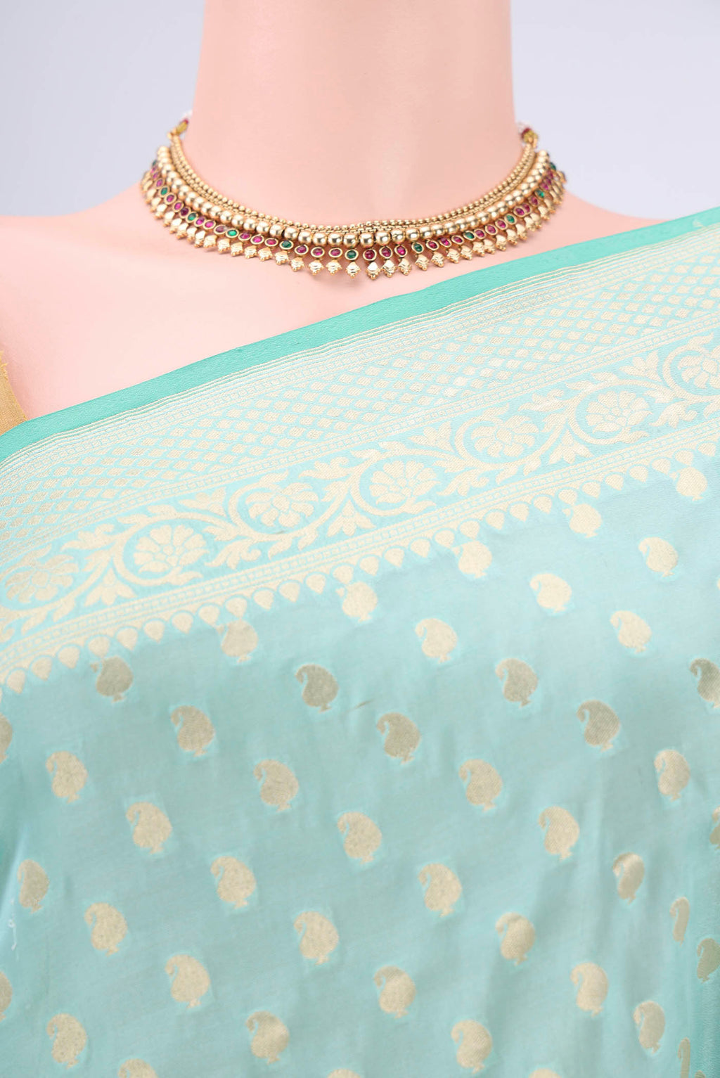 Border image of Mint Green Dual Tone Banarasi Silk Saree with Zari Butta on the body and Zari Border. 
