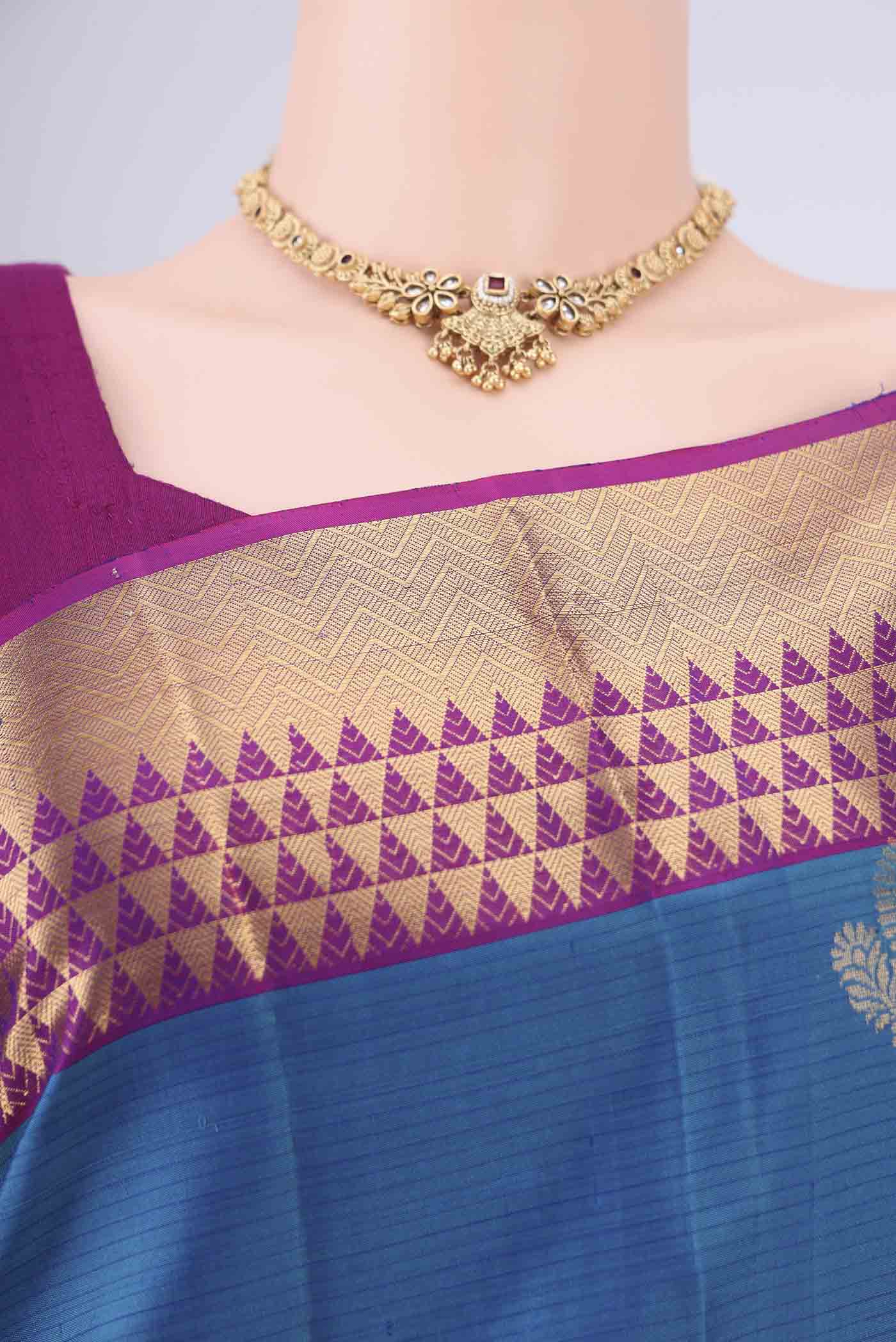 Border image of Blue Soft Silk Saree with Zari Butta on the body and Zari Border. 